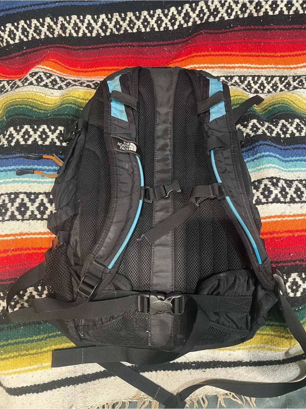 The North Face Men’s “Hot Shot” Blue and Black Backpack with Orange Accents